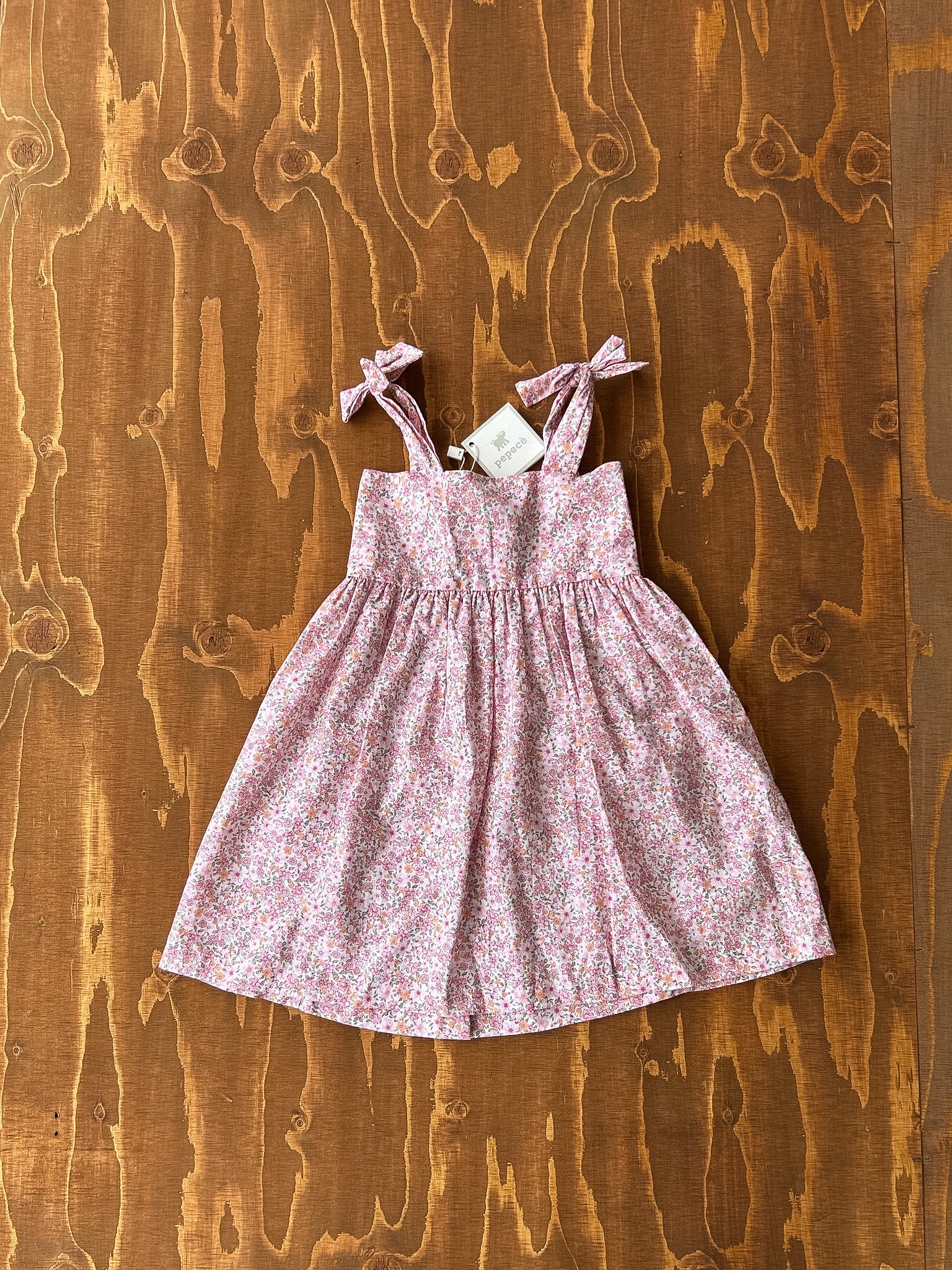 Vestitino floreale con fiocchi