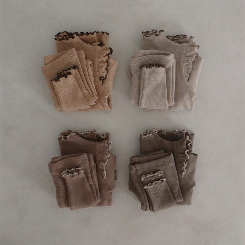 Completo a costine con maglia e leggings